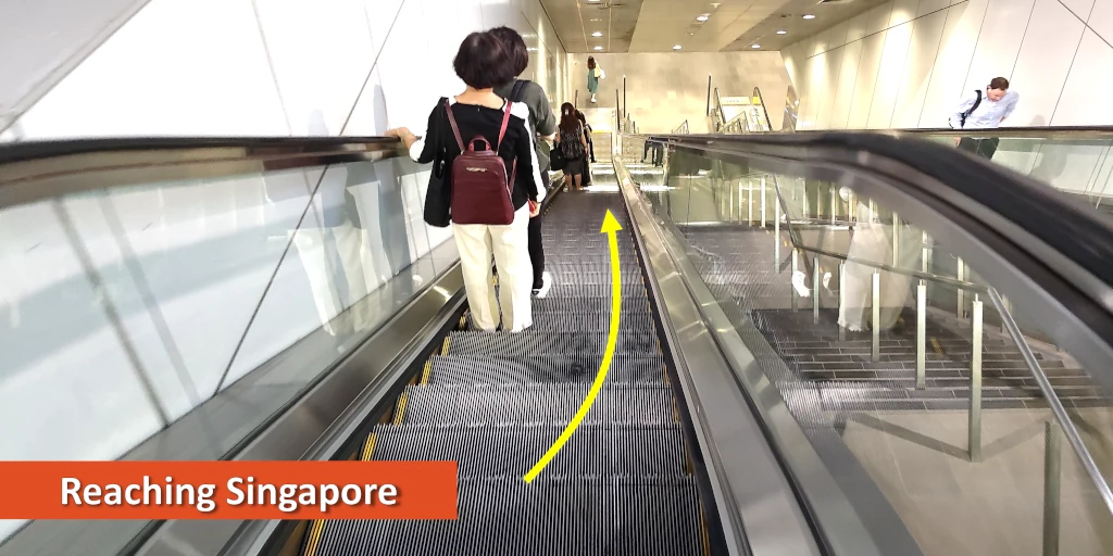 Photo of an escalator going down